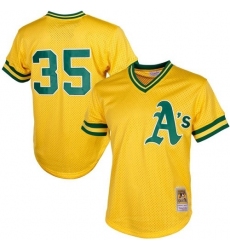 Men's Mitchell and Ness Oakland Athletics #35 Rickey Henderson Replica Gold 1984 Throwback MLB Jersey